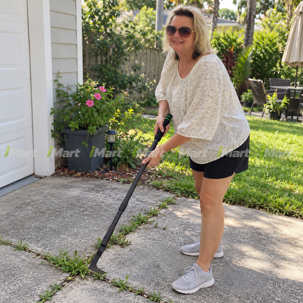 
Rachel M using adjustable crevice weeder