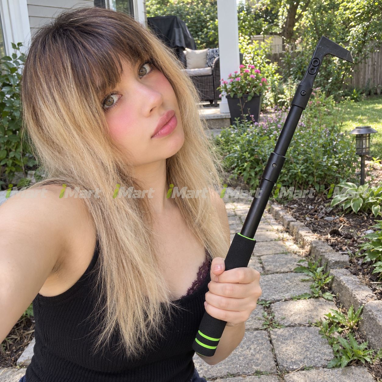 
Amanda R. using adjustable crevice weeder